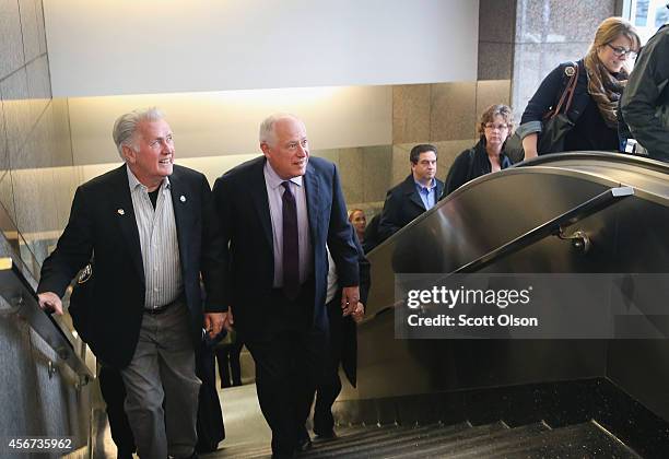 Actor Martin Sheen campaigns with Illinois Gov. Pat Quinn at a commuter train station on October 6, 2014 in Chicago, Illinois. Quinn, a Democrat, is...