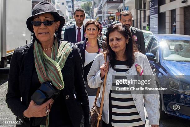 Anni Dewani's family returns to the Western Cape High Court after a lunch break during the first day of trial of Shrien Dewani on October 6, 2014 in...