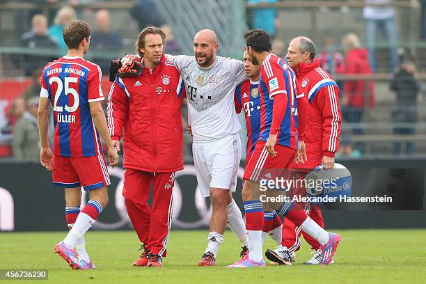 Pepe Reina, keeper of Muenchen gets injured during the Finale of the Paulaner Cup 2014 between FC Bayern Muenchen and Paulaner Traumelf at Alpenbauer...