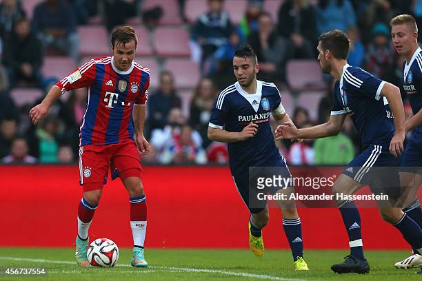 Mario Goetze of Muenchen battles for the ball during the Finale of the Paulaner Cup 2014 between FC Bayern Muenchen and Paulaner Traumelf at...