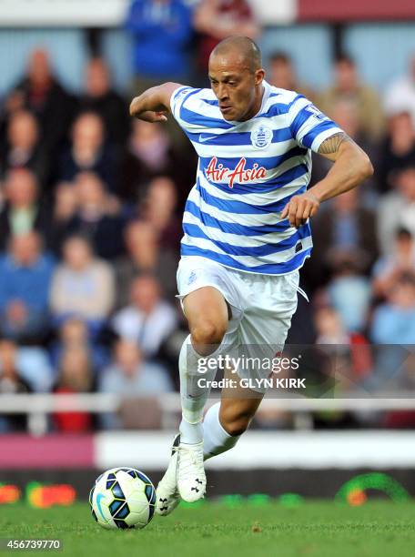 Queens Park Rangers' English striker Bobby Zamora controls the ball during the English Premier League football match against West Ham United at the...