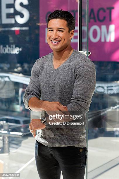 Mario Lopez hosts "Extra" at their New York studios at H&M in Times Square on October 6, 2014 in New York City.