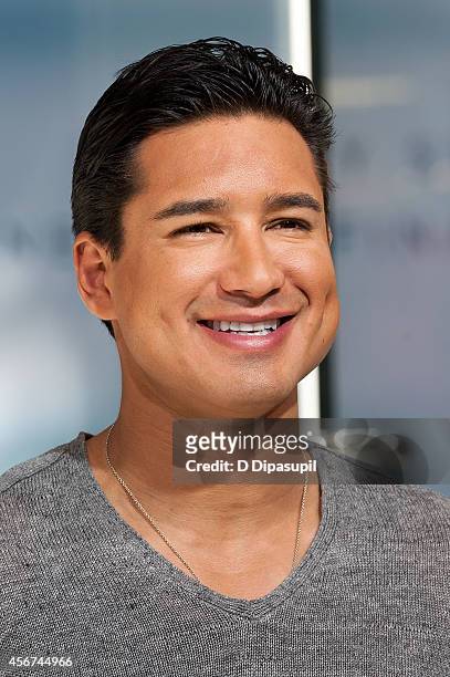 Mario Lopez hosts "Extra" at their New York studios at H&M in Times Square on October 6, 2014 in New York City.