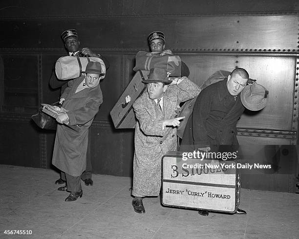 Larry Fine, Moe Howard and Jerry "Curly" Howard arrive at Penn Station.