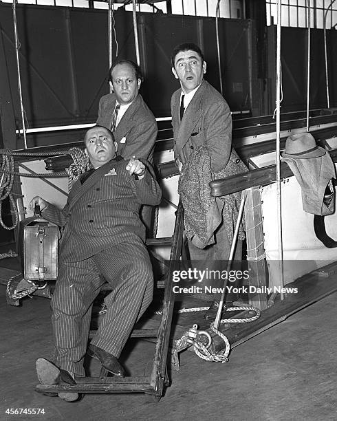 Arrived on the Queen Mary. Thespians all, they are known as The Three Stooges. They slap faces, poke eyes and kick pants for a living. Top , Larry...