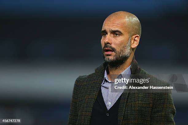 Josep Guardiola, head coach of Muenchen looks on during the Finale of the Paulaner Cup 2014 between FC Bayern Muenchen and Paulaner Traumelf at...