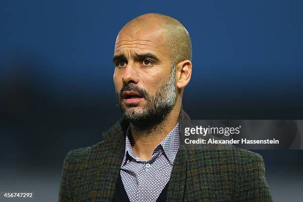 Josep Guardiola, head coach of Muenchen looks on during the Finale of the Paulaner Cup 2014 between FC Bayern Muenchen and Paulaner Traumelf at...