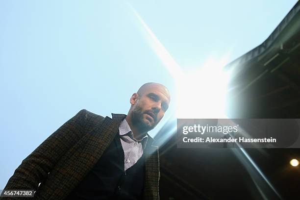 Josep Guardiola, head coach of Muenchen looks on during the Finale of the Paulaner Cup 2014 between FC Bayern Muenchen and Paulaner Traumelf at...