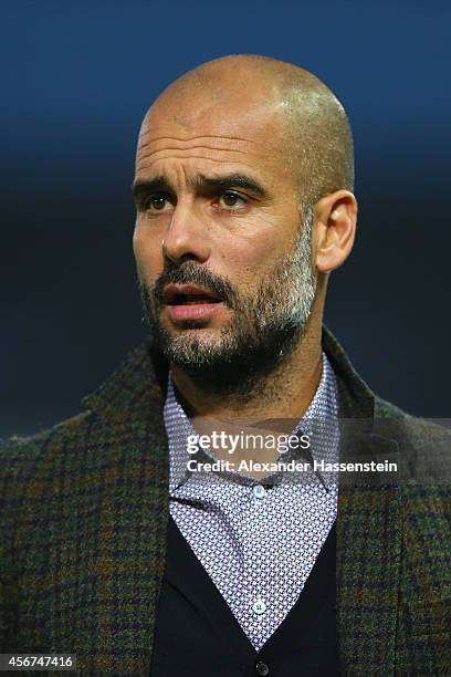 Josep Guardiola, head coach of Muenchen looks on during the Finale of the Paulaner Cup 2014 between FC Bayern Muenchen and Paulaner Traumelf at...