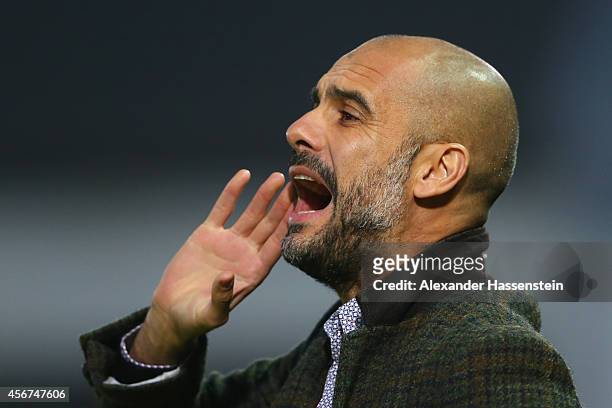Josep Guardiola, head coach of Muenchen reacts during the Finale of the Paulaner Cup 2014 between FC Bayern Muenchen and Paulaner Traumelf at...