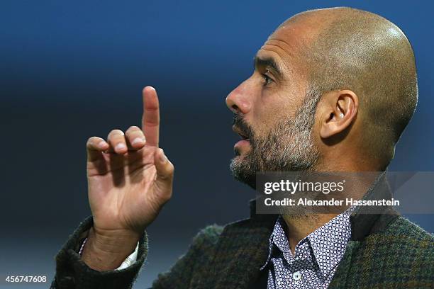 Josep Guardiola, head coach of Muenchen reacts during the Finale of the Paulaner Cup 2014 between FC Bayern Muenchen and Paulaner Traumelf at...