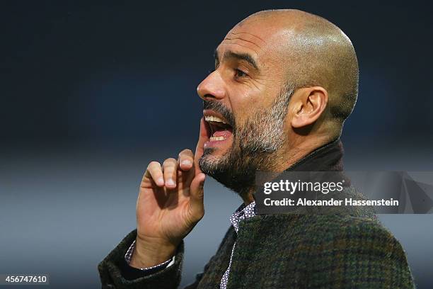 Josep Guardiola, head coach of Muenchen reacts during the Finale of the Paulaner Cup 2014 between FC Bayern Muenchen and Paulaner Traumelf at...