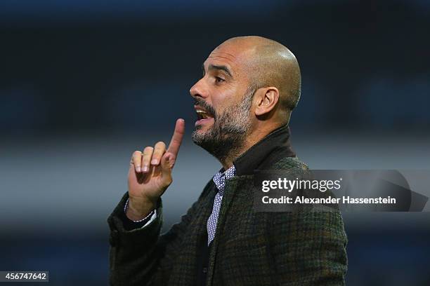 Josep Guardiola, head coach of Muenchen reacts during the Finale of the Paulaner Cup 2014 between FC Bayern Muenchen and Paulaner Traumelf at...