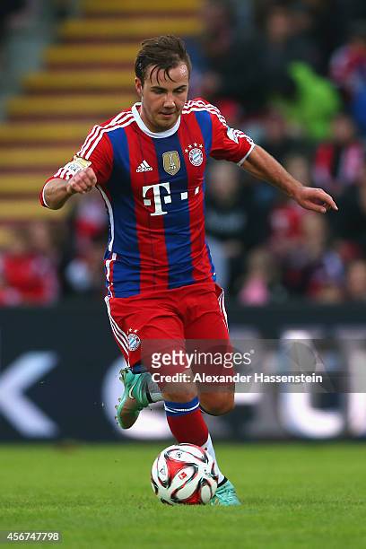 Mario Goetze of Muenchen runs with the ball during the Finale of the Paulaner Cup 2014 between FC Bayern Muenchen and Paulaner Traumelf at Alpenbauer...