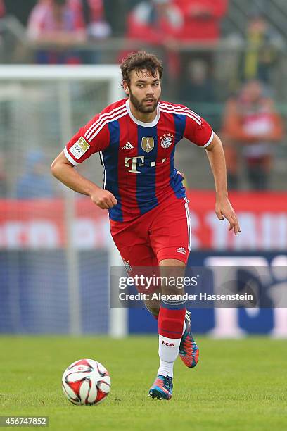 Philipp Walter of Muenchen runs with the ball during the Finale of the Paulaner Cup 2014 between FC Bayern Muenchen and Paulaner Traumelf at...