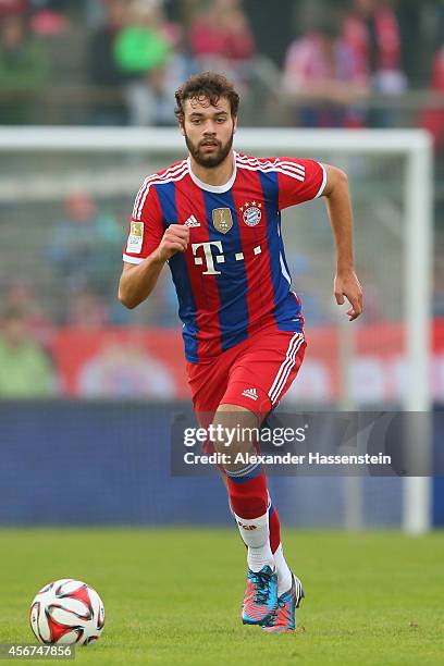 Philipp Walter of Muenchen runs with the ball during the Finale of the Paulaner Cup 2014 between FC Bayern Muenchen and Paulaner Traumelf at...