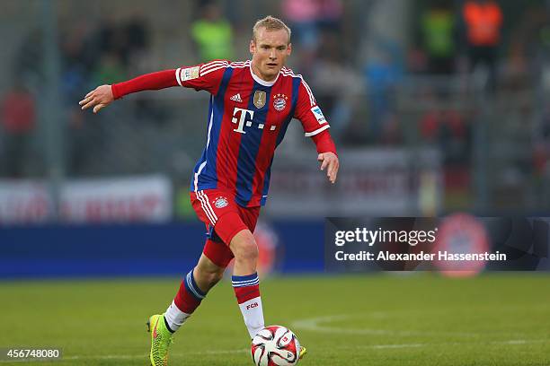 Sebastian Rode of Muenchen runs with the ball during the Finale of the Paulaner Cup 2014 between FC Bayern Muenchen and Paulaner Traumelf at...