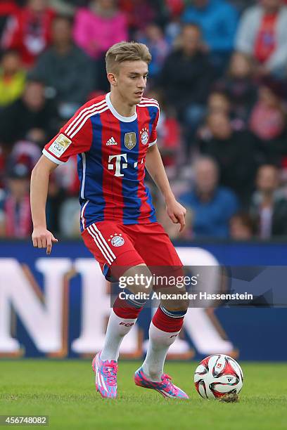 Sinan Kurt of Muenchen runs with the ball during the Finale of the Paulaner Cup 2014 between FC Bayern Muenchen and Paulaner Traumelf at Alpenbauer...