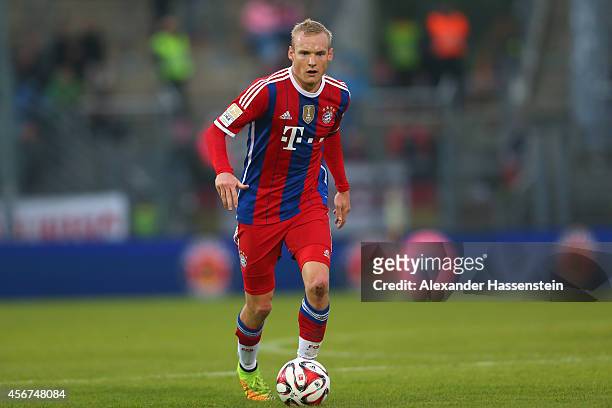 Sebastian Rode of Muenchen runs with the ball during the Finale of the Paulaner Cup 2014 between FC Bayern Muenchen and Paulaner Traumelf at...