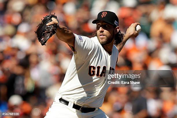 Madison Bumgarner of the San Francisco Giants pitches in the first inning against the Washington Nationals during Game Three of the National League...