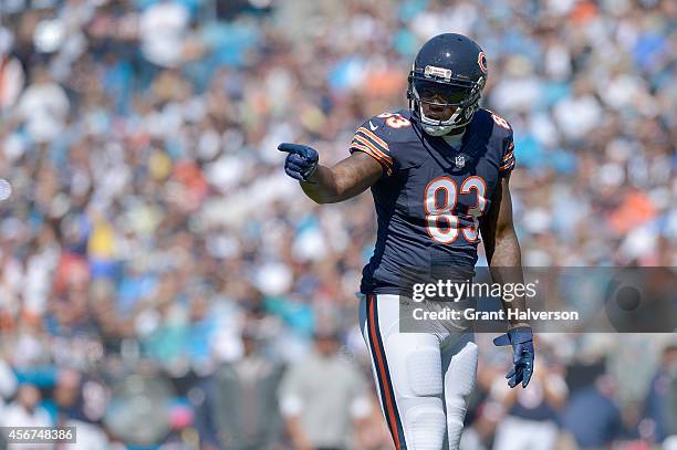 Martellus Bennett of the Chicago Bears lines up against the Carolina Panthers during their game at Bank of America Stadium on October 5, 2014 in...