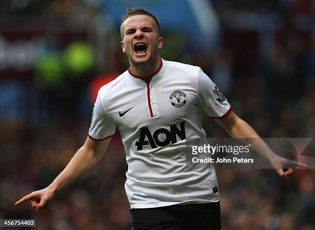 Tom Cleverly of Manchester United celebrates scoring their third goal during the Barclays Premier League match between Aston Villa and Manchester...