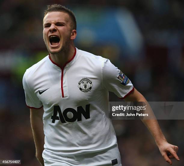 Tom Cleverly of Manchester United celebrates scoring their third goal during the Barclays Premier League match between Aston Villa and Manchester...