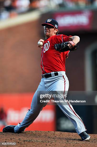 Tyler Clippard of the Washington Nationals pitches in the eighth inning against the San Francisco Giants during Game Three of the National League...