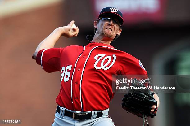 Tyler Clippard of the Washington Nationals pitches in the eighth inning against the San Francisco Giants during Game Three of the National League...