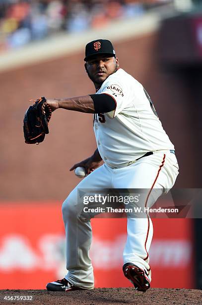 Jean Machi of the San Francisco Giants pitches in the eighth inning against the Washington Nationals during Game Three of the National League...