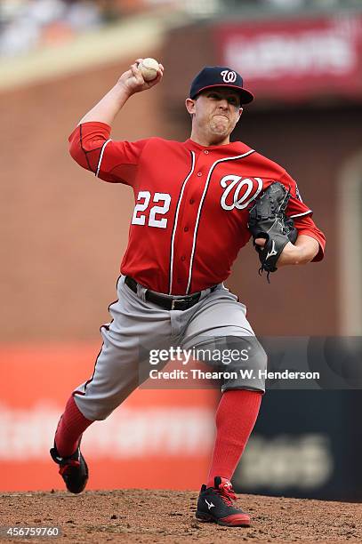 Drew Storen of the Washington Nationals pitches in the ninth inning against the San Francisco Giants during Game Three of the National League...