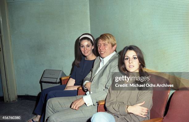 Wrecking crew pianist Don Randi, and Dean Martin's daughters Deana Martin and Gail Martin in the studio in circa 1966 in Los Angeles, California.