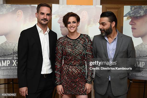 Writer/director Peter Sattler and actors Kristen Stewart and Peyman Moaadi attend the "Camp X-Ray" New York premiere at the Crosby Street Hotel on...