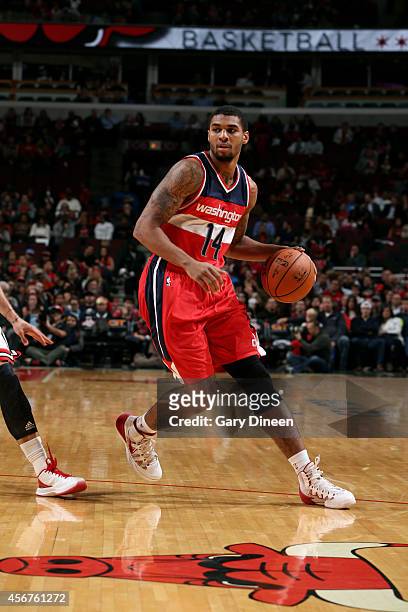 Glen Rice Jr. #14 of the Washington Wizards drives against the Chicago Bulls on October 6, 2014 at the United Center in Chicago, Illinois. NOTE TO...
