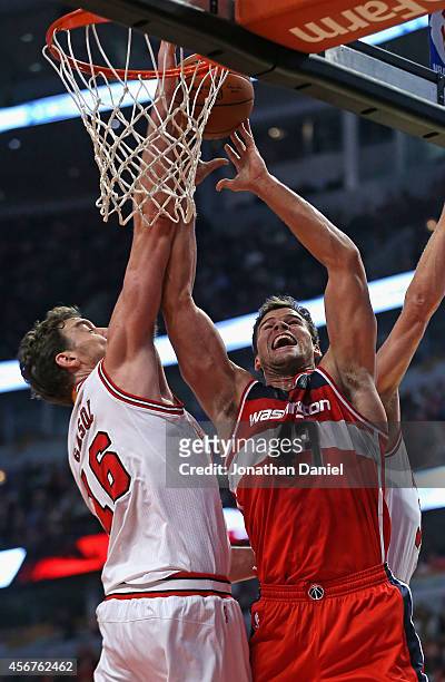 Pau Gasol of the Chicago Bulls blocks a shot by Kris Humphries of the Washington Wizards during a preseason game at the United Center on October 6,...