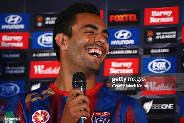 Marcos Flores of the Newcastle Jets laughs as he is interviewed on stage during the A-League 2014-15 Season launch at Allianz Stadium on October 7,...