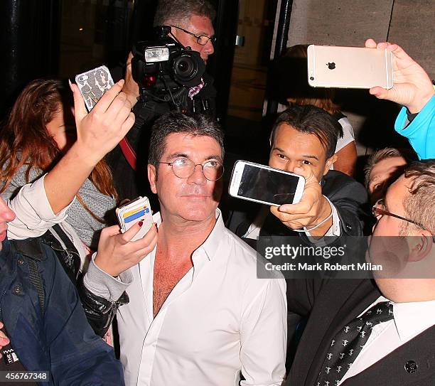 Simon Cowell attend the Pride of Britain awards at The Grosvenor House Hotel on October 6, 2014 in London, England.