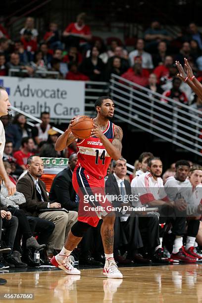 Glen Rice Jr. #14 of the Washington Wizards handles the ball against the Chicago Bulls on October 6, 2014 at the United Center in Chicago, Illinois....