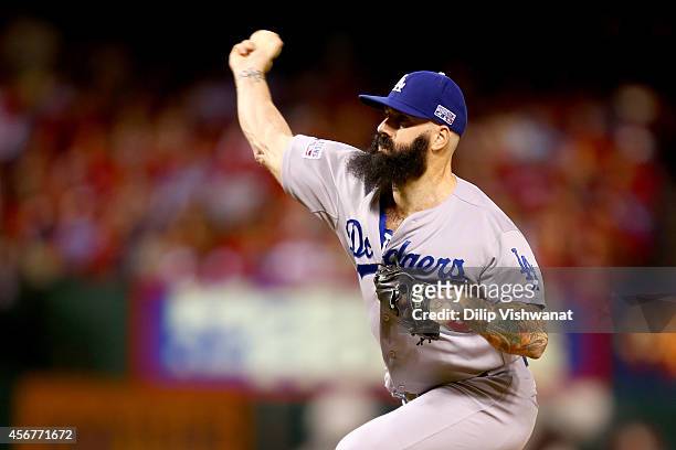 Brian Wilson of the Los Angeles Dodgers pitches in the eighth inning against the St. Louis Cardinals in Game Three of the National League Division...