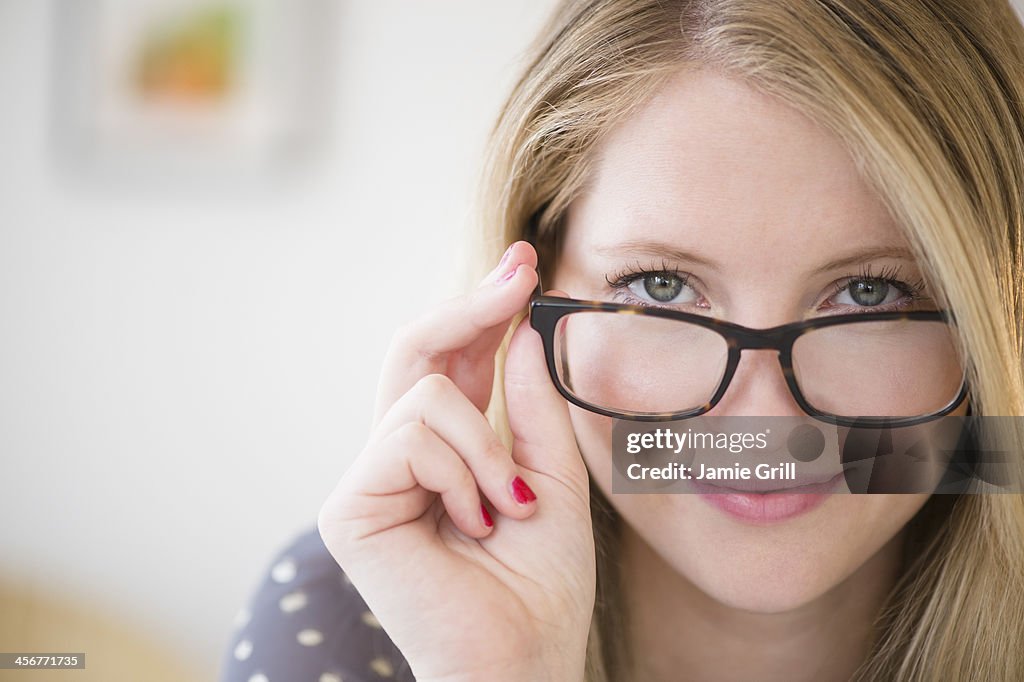 Look Over Spectacles Woman Looking Over Glasses High-Res Stock Photo - Getty Images