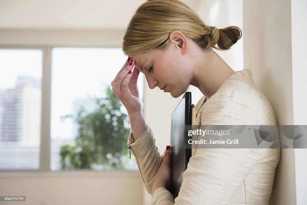 Businesswoman with headache