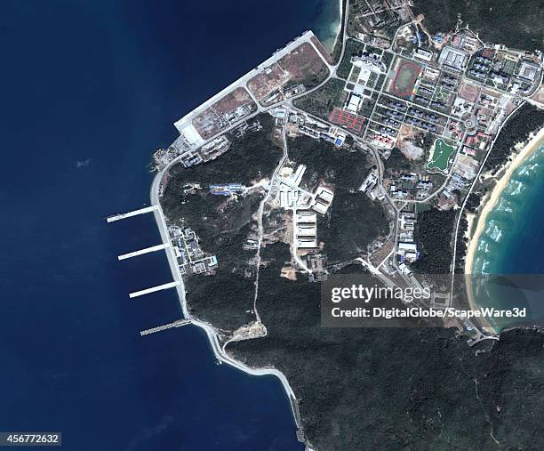 DigitalGlobe via Getty Images close-up satellite imagery of the Yulin Naval Base shows a ported submarine. According to several intelligence...