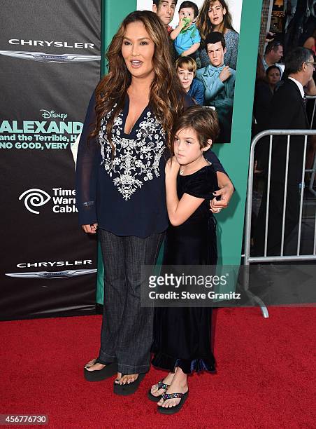 Tia Carrere and Bianca Wakelin arrives at the "Alexander And The Terrible, Horrible, No Good, Very Bad Day" - Los Angeles Premiere at the El Capitan...