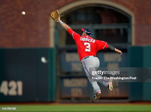 Washington second baseman Asdrubal Cabrera cannot get to San Francisco's Pablo Sandoval's 9th inning single as the Washington Nationals defeat the...