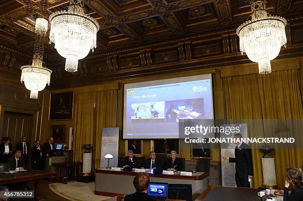 Nobel Committee for Physics chairman Per Delsing, Staffan Normark, Permanent Secretary of the Royal Swedish Academy of Sciences, and Nobel Committee...