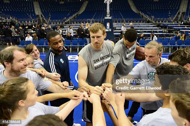 Matt Bonner of the San Antonio Spurs huddles during an NBA Cares Special Olympics Clinic as part of the 2014 Global Games on October 7, 2014 at the...