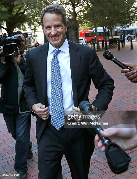 Former U.S. Treasury Secretary Timothy Geithner walks to the U.S. Court of Federal Claims October 7, 2014 in Washington, DC. Geithner will be a...