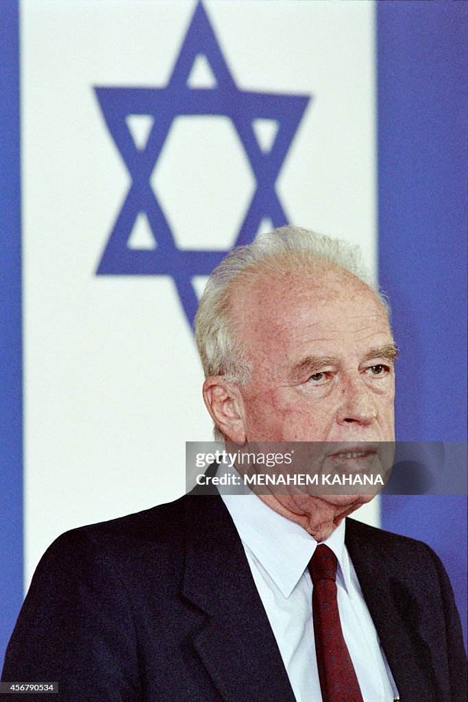 Israeli Prime Minister Yitzhak Rabin briefs a gathering of his... News ...