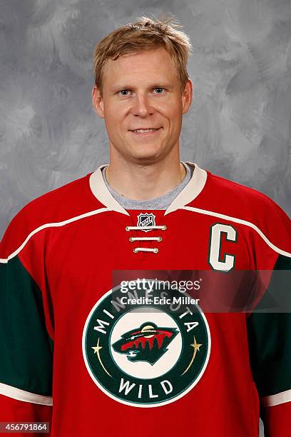 Mikko Koivu of the Minnesota Wild poses for his official headshot for the 2014-2015 season on September 18, 2014 at the Xcel Energy Center in St....