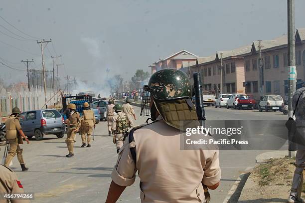 The policemen are moving forward to the protesters area throwing tear gas and firing rubber bullets during the demonstration against "Human Rights...